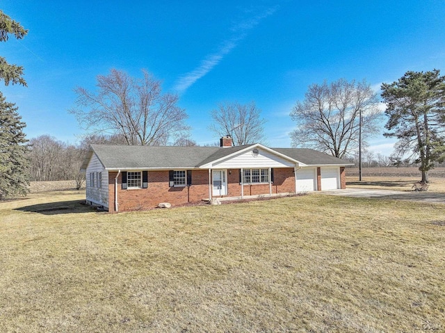 ranch-style house featuring a front lawn, brick siding, an attached garage, and a chimney