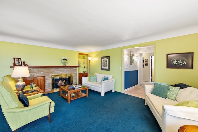 carpeted living room featuring tile patterned floors and a fireplace