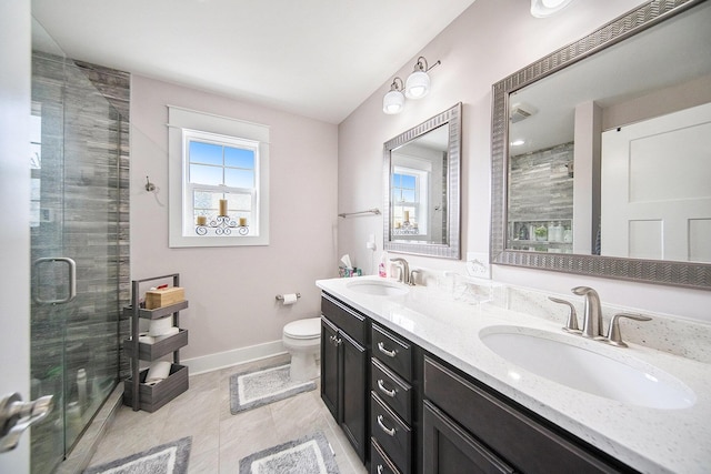 bathroom featuring a sink, plenty of natural light, and a stall shower