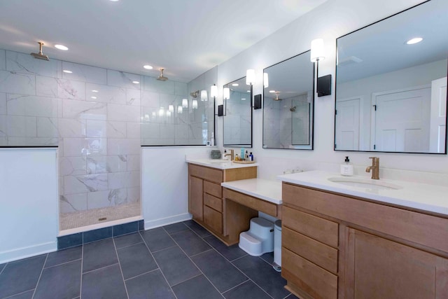 bathroom with two vanities, a walk in shower, a sink, recessed lighting, and tile patterned flooring