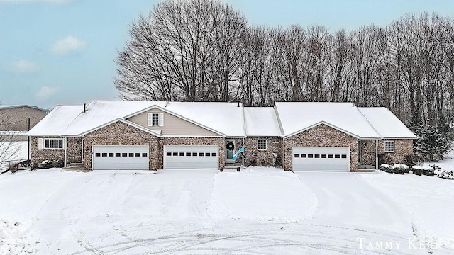 ranch-style house featuring an attached garage