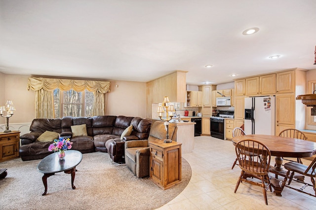 living room with light tile patterned floors and recessed lighting