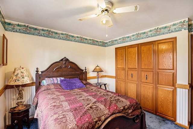 bedroom with a closet, ceiling fan, and carpet