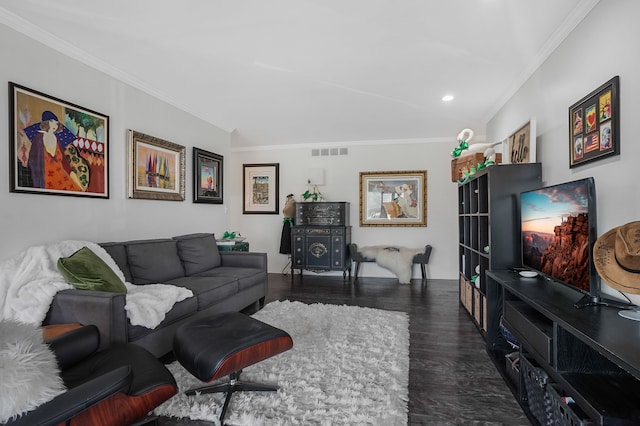 living room featuring visible vents, wood finished floors, and ornamental molding