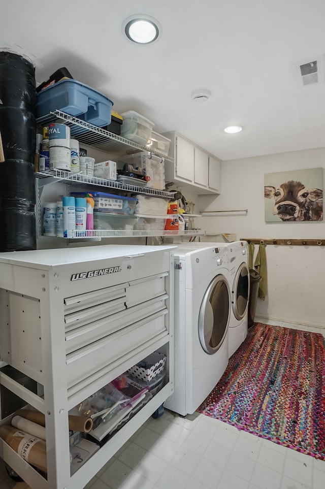 laundry area with recessed lighting, separate washer and dryer, visible vents, and light floors