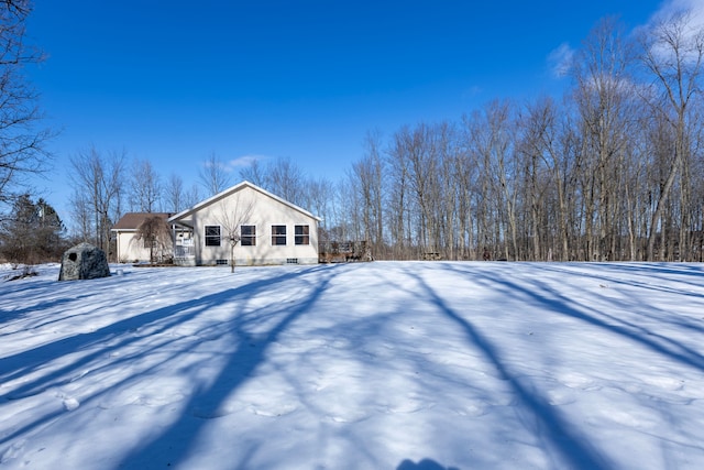 view of snow covered property