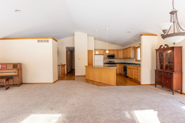 kitchen featuring stainless steel appliances, light colored carpet, visible vents, and open floor plan