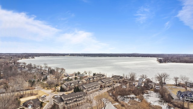 birds eye view of property with a residential view and a water view