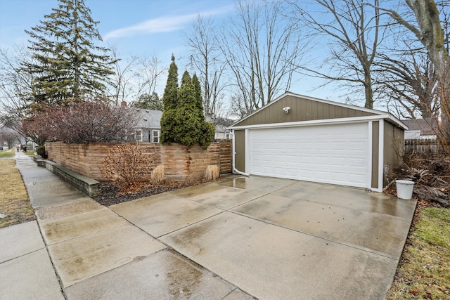 detached garage with fence