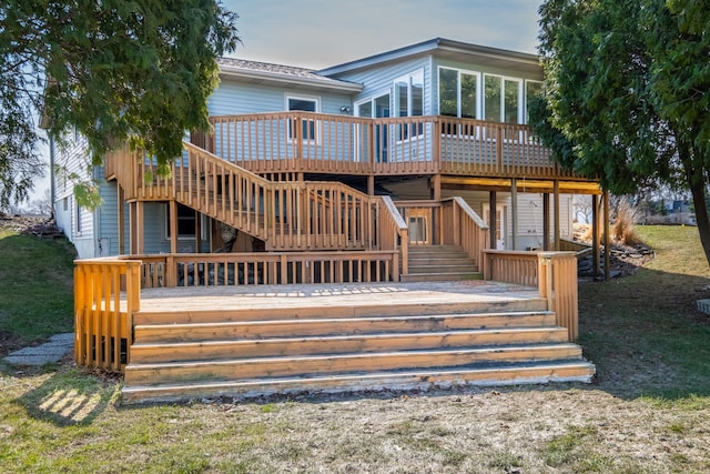 back of house with a wooden deck