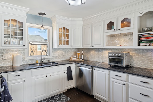 kitchen with a sink, stainless steel dishwasher, and white cabinetry