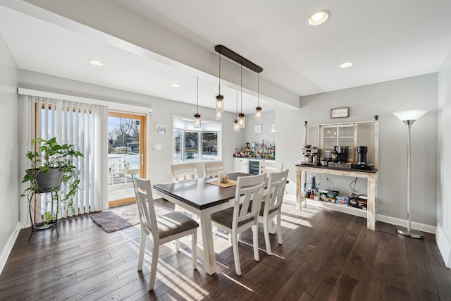 dining space featuring recessed lighting, dark wood-style floors, and baseboards