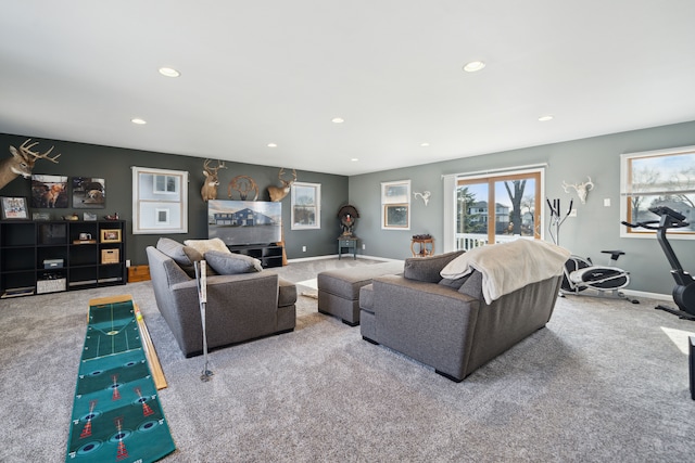 carpeted living room with recessed lighting, a fireplace, and baseboards