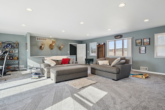 living area featuring recessed lighting, visible vents, carpet flooring, and baseboards