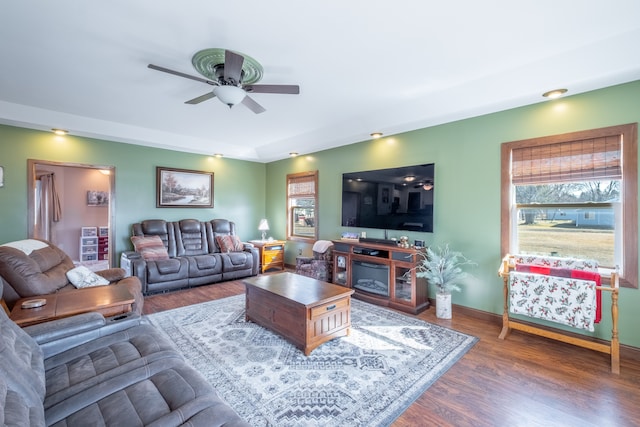 living room with recessed lighting, wood finished floors, baseboards, and ceiling fan