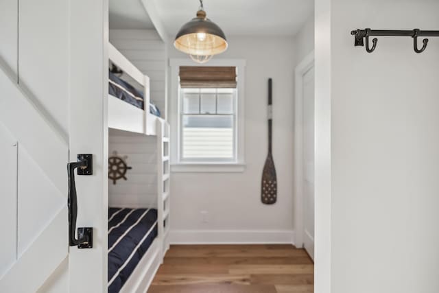 spacious closet featuring wood finished floors