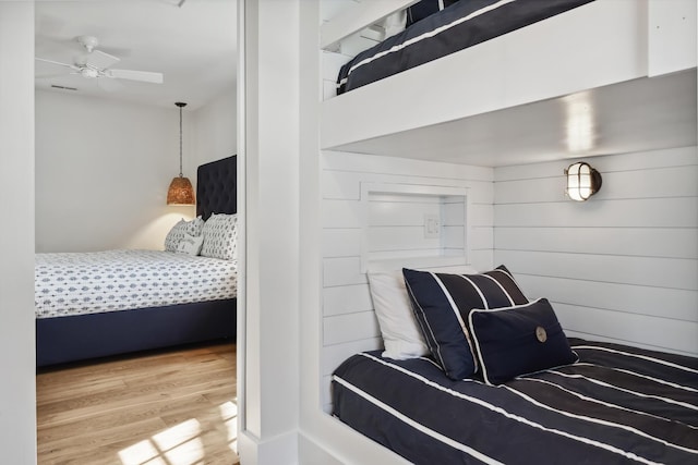 bedroom featuring wood finished floors