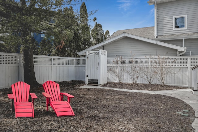 view of yard featuring fence