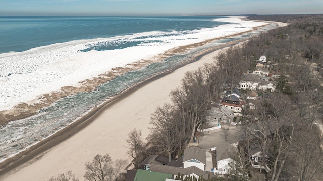 bird's eye view featuring a view of the beach and a water view