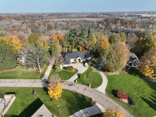 bird's eye view with a view of trees