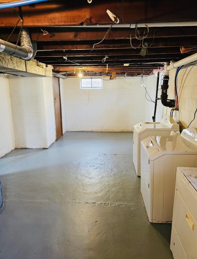 basement with washing machine and dryer