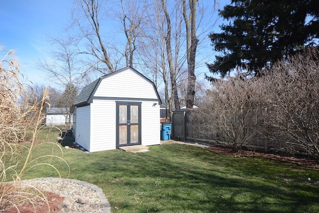 view of shed with fence