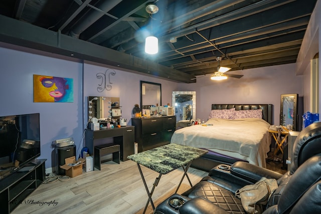 bedroom featuring wood finished floors