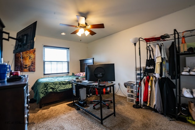 carpeted bedroom with a ceiling fan