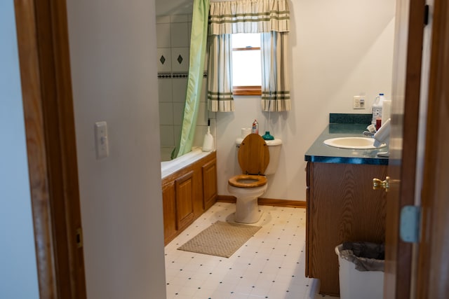 bathroom with vanity, baseboards, tile patterned floors, toilet, and shower / tub combo with curtain