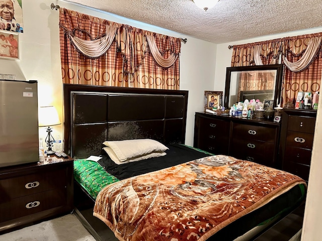 bedroom with a textured ceiling