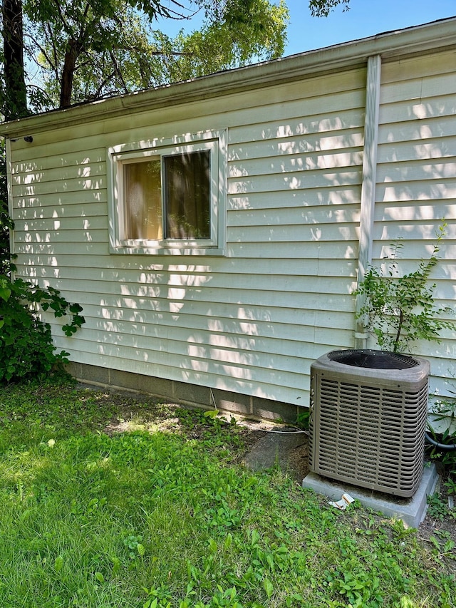 view of home's exterior featuring cooling unit