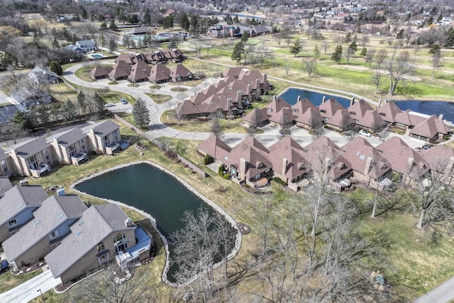 bird's eye view with a residential view and a water view