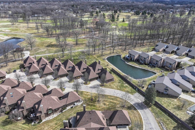 bird's eye view with a water view and a residential view