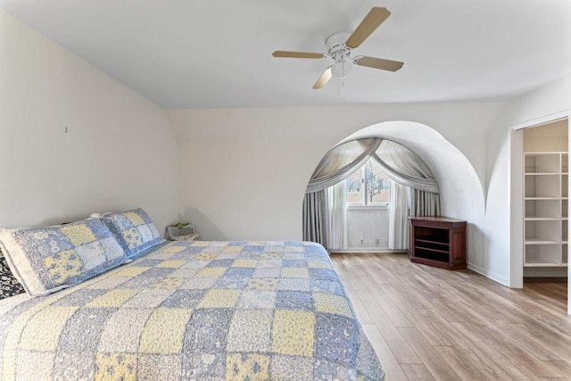 bedroom featuring wood finished floors and ceiling fan