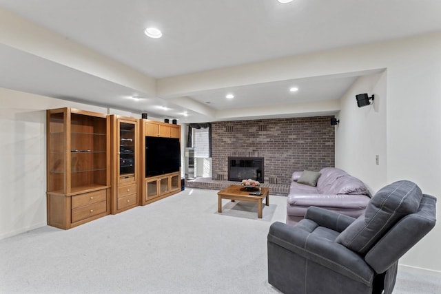 living room with recessed lighting, baseboards, light colored carpet, and a brick fireplace