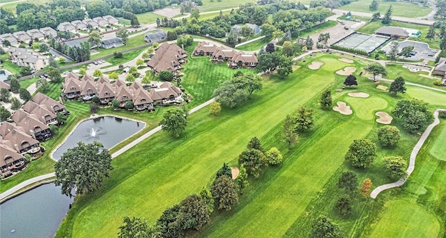 drone / aerial view with a residential view and a water view