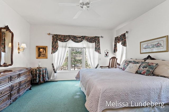 bedroom with a ceiling fan and carpet floors