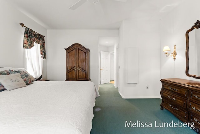 carpeted bedroom with baseboards and a ceiling fan