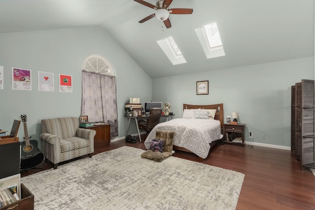 bedroom with dark wood-style floors, a ceiling fan, baseboards, and vaulted ceiling