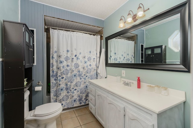 full bathroom with vanity, tile patterned floors, toilet, and a shower with shower curtain