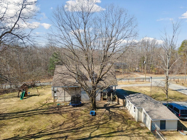 view of yard featuring a trampoline