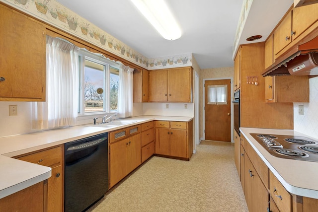 kitchen with light floors, stainless steel electric cooktop, a sink, black dishwasher, and under cabinet range hood