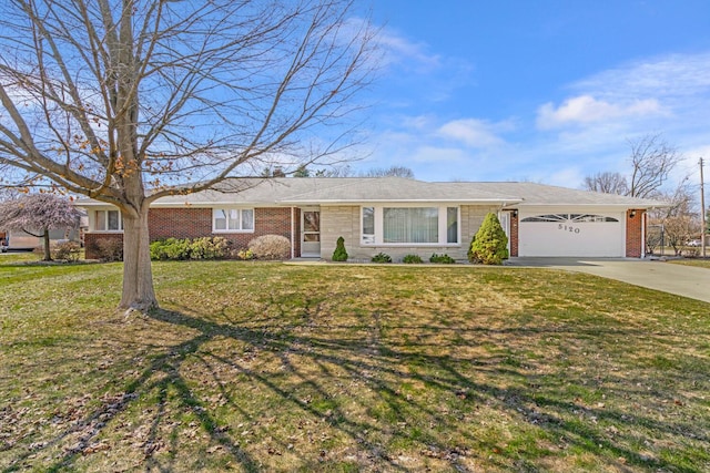 ranch-style home featuring a front yard, brick siding, a garage, and driveway