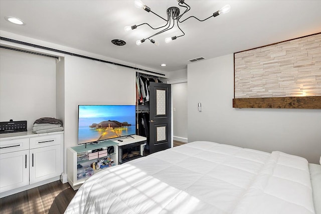 bedroom featuring visible vents, recessed lighting, and dark wood-type flooring