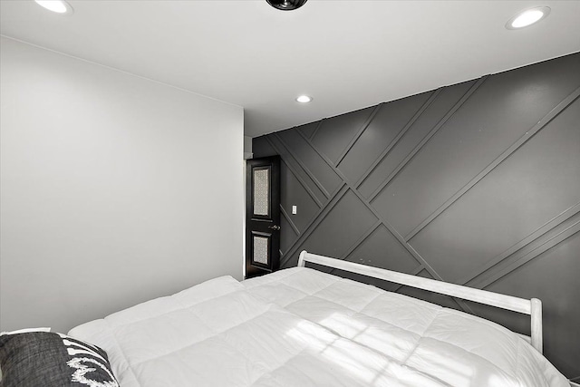 bedroom with recessed lighting