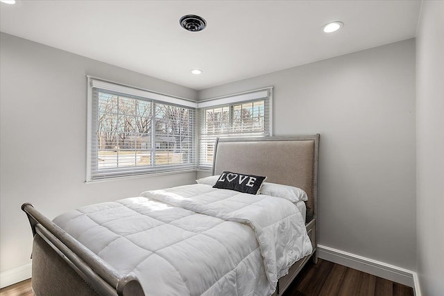 bedroom featuring recessed lighting, baseboards, and wood finished floors