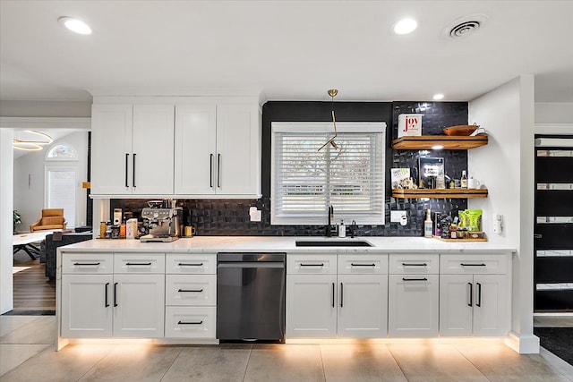 kitchen with visible vents, white cabinetry, open shelves, a sink, and dishwasher