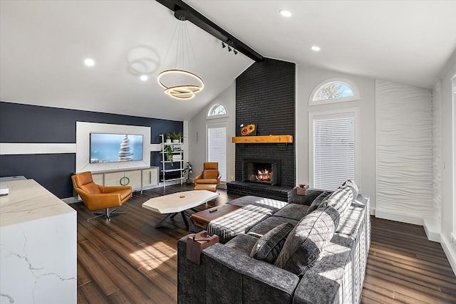 living room with wood finished floors, baseboards, a fireplace, recessed lighting, and beamed ceiling