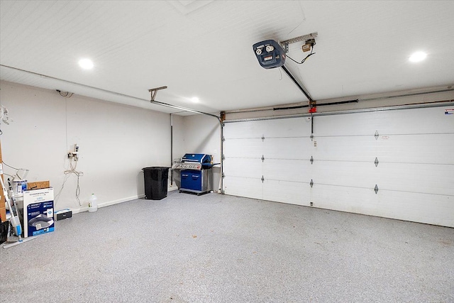 garage featuring a garage door opener