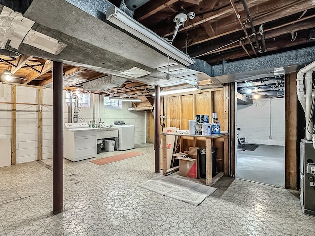 basement with washing machine and dryer